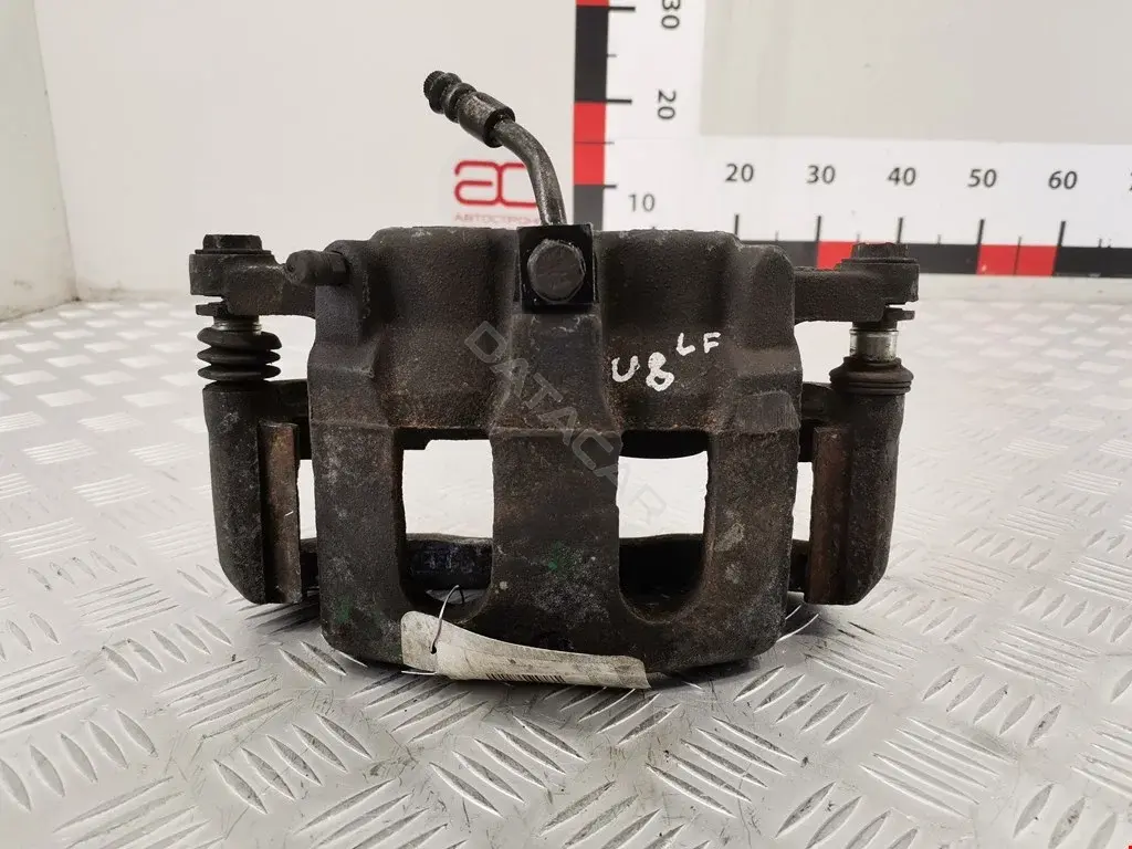 Суппорт тормозной 8A8Z2B120AA