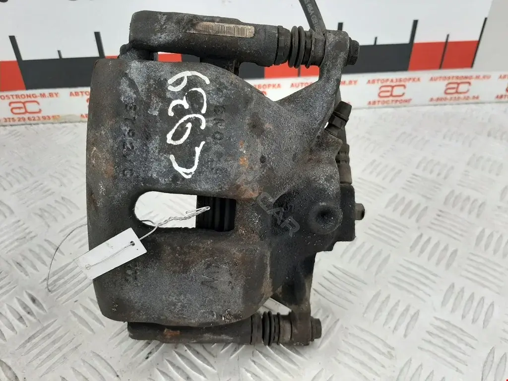 Суппорт тормозной 8V0615124