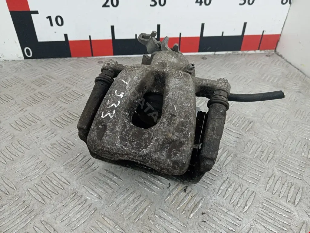 Суппорт тормозной 735382123