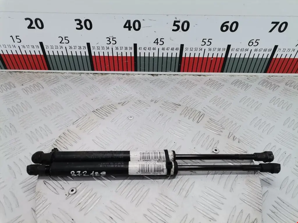 Амортизатор крышки багажника, капота, заднего стекла 645300W091