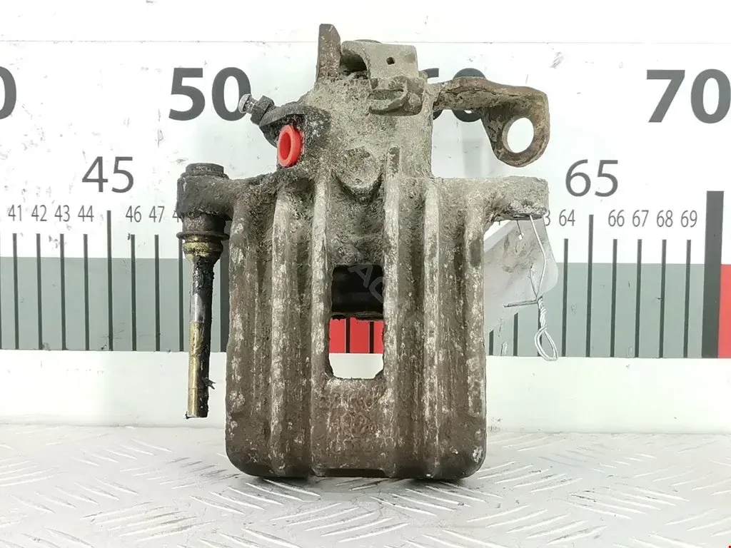 Суппорт тормозной 0590328SX, 0986473099, 100310005