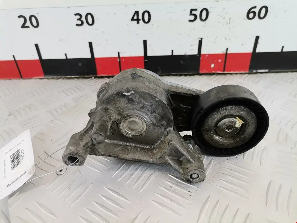Натяжитель ремня генератора 0380715, 03G903315, 03G903315A