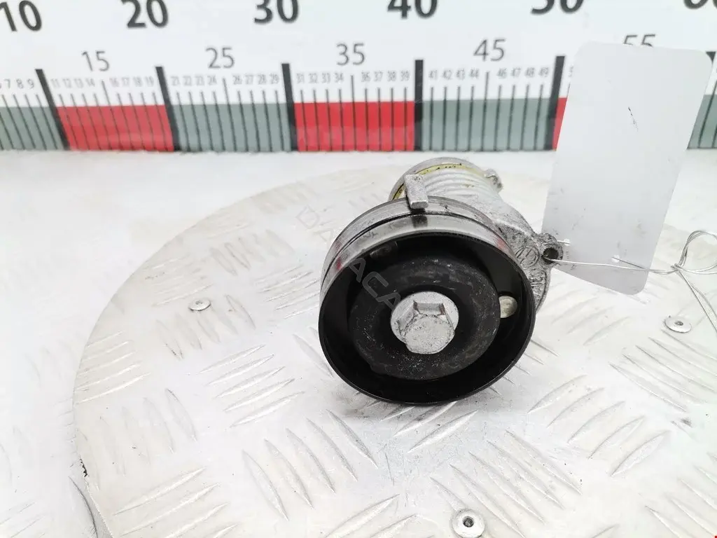 Натяжитель ремня генератора 0023003916, 0100, 02311