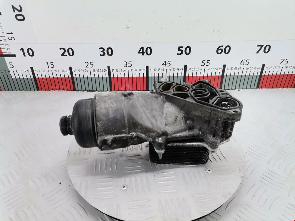 Корпус масляного фильтра 00001103L1, 0011021403, 09013700