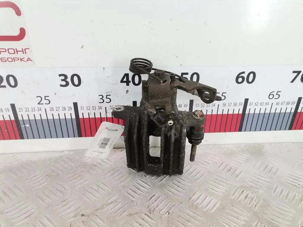 Суппорт тормозной 0590084SX, 0986474831, 100410002