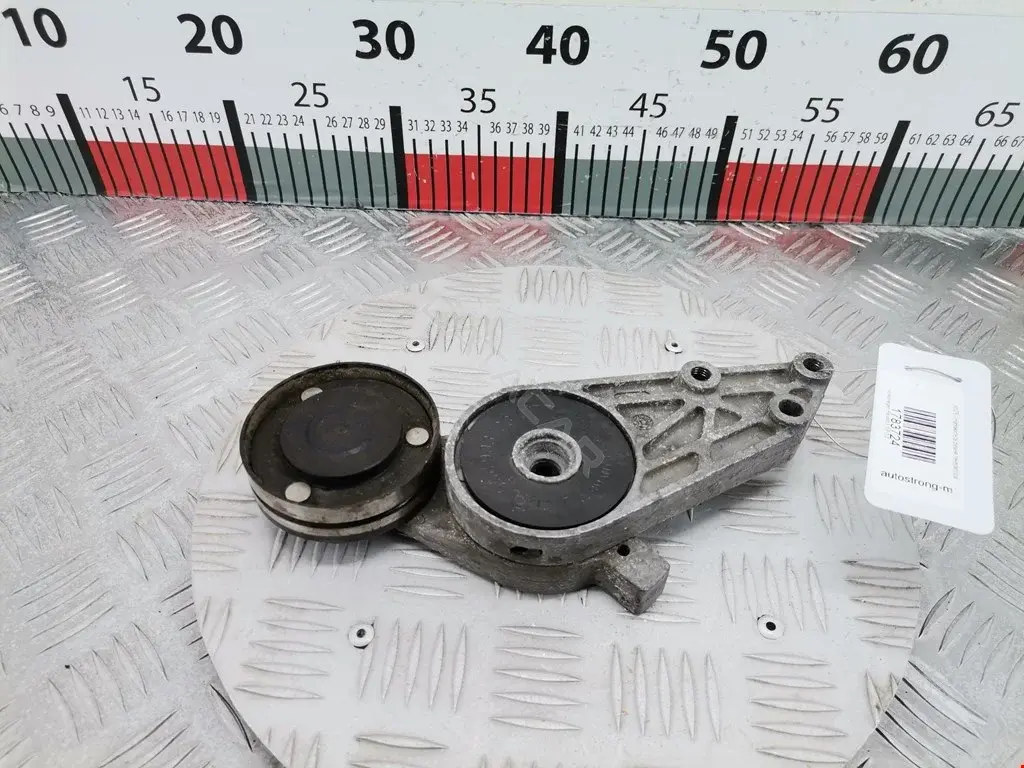 Натяжитель ремня генератора 058903133, 058903133B, 058903133D