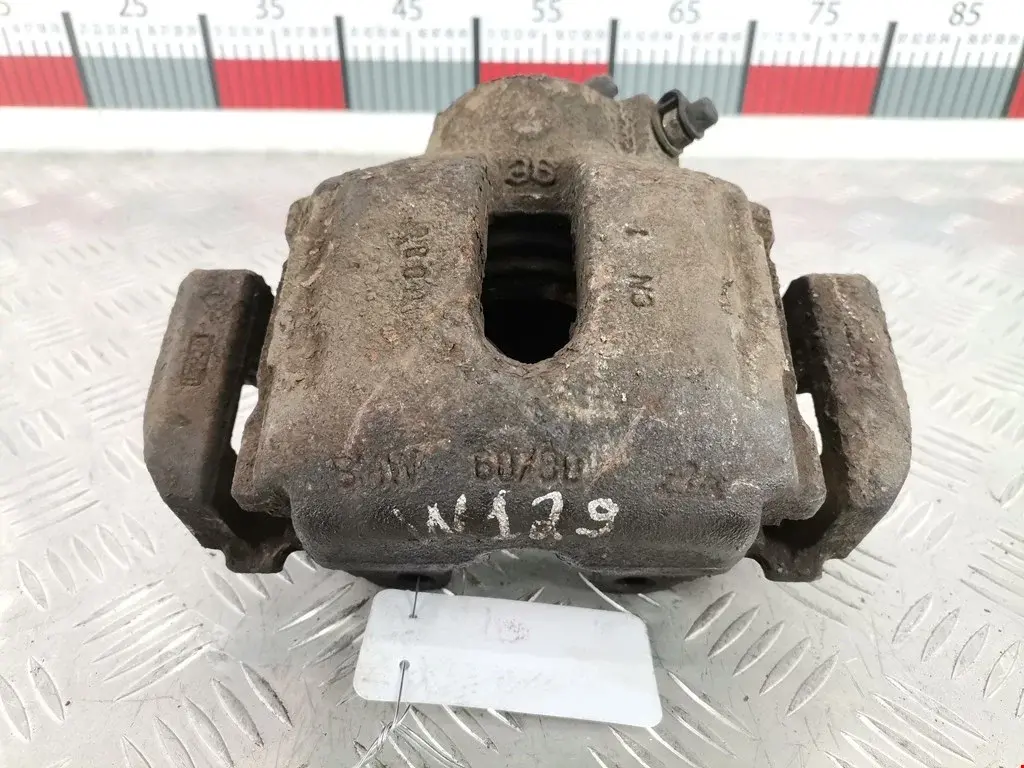 Суппорт тормозной 0590357SX, 0986474262, 34111163304