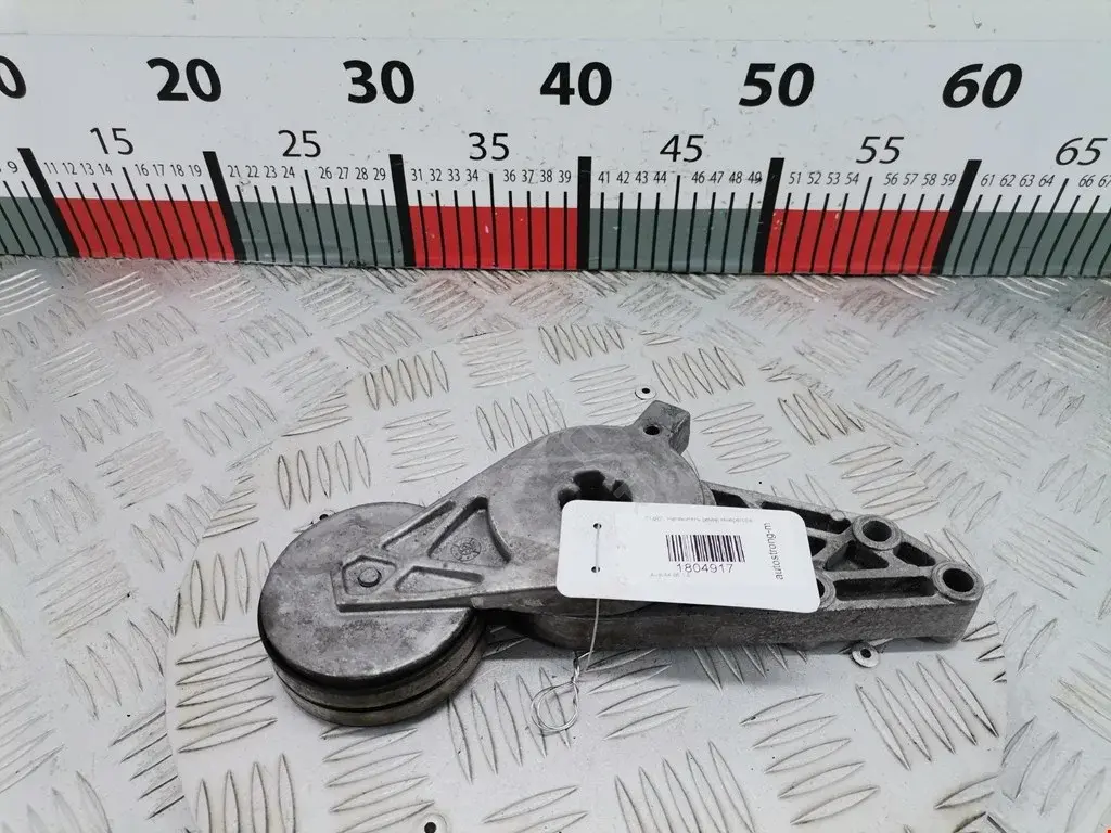 Натяжитель ремня генератора 058903133, 058903133B, 058903133D