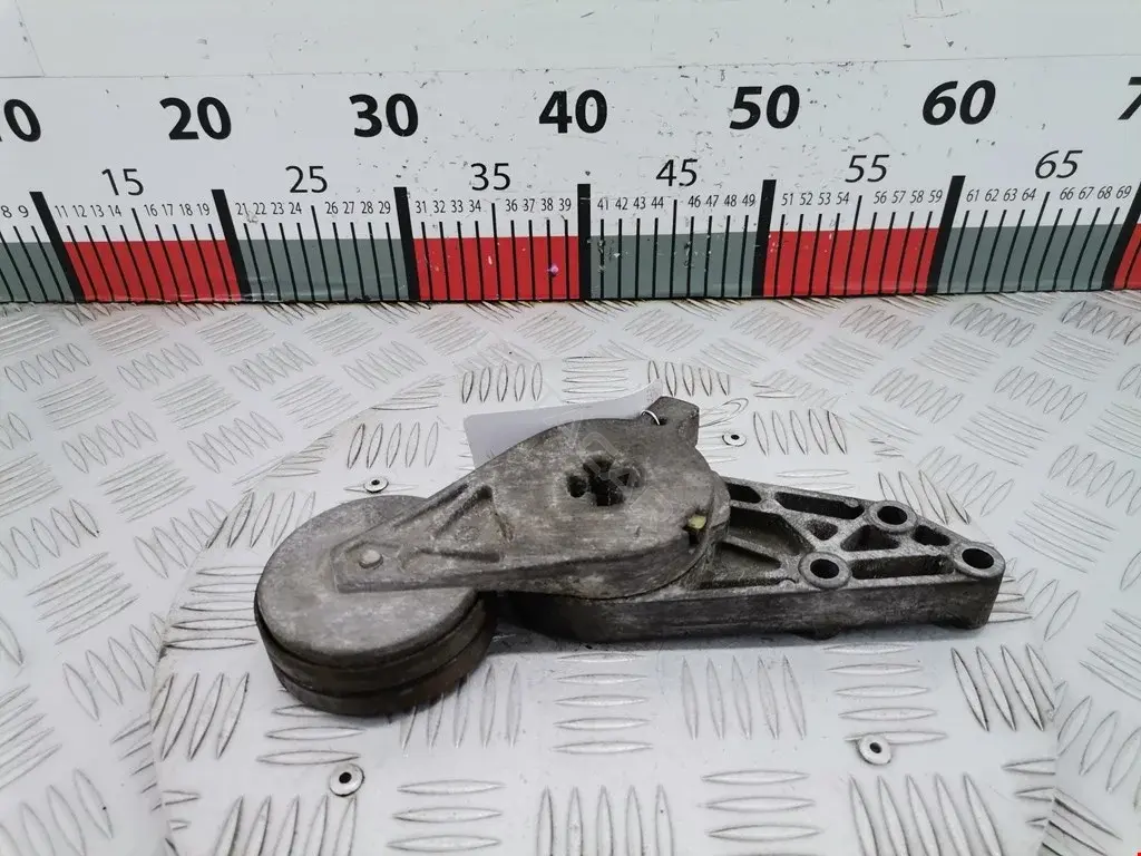 Натяжитель ремня генератора 058903133, 058903133B, 058903133D