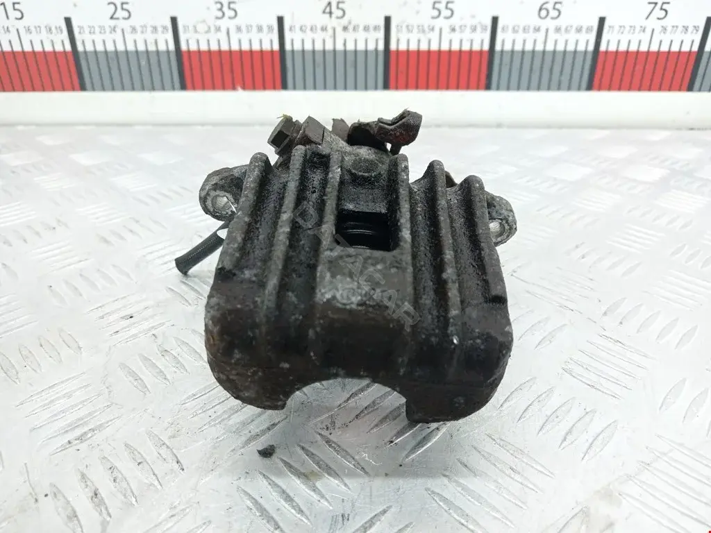 Суппорт тормозной 0590328SX, 0986473099, 100310005