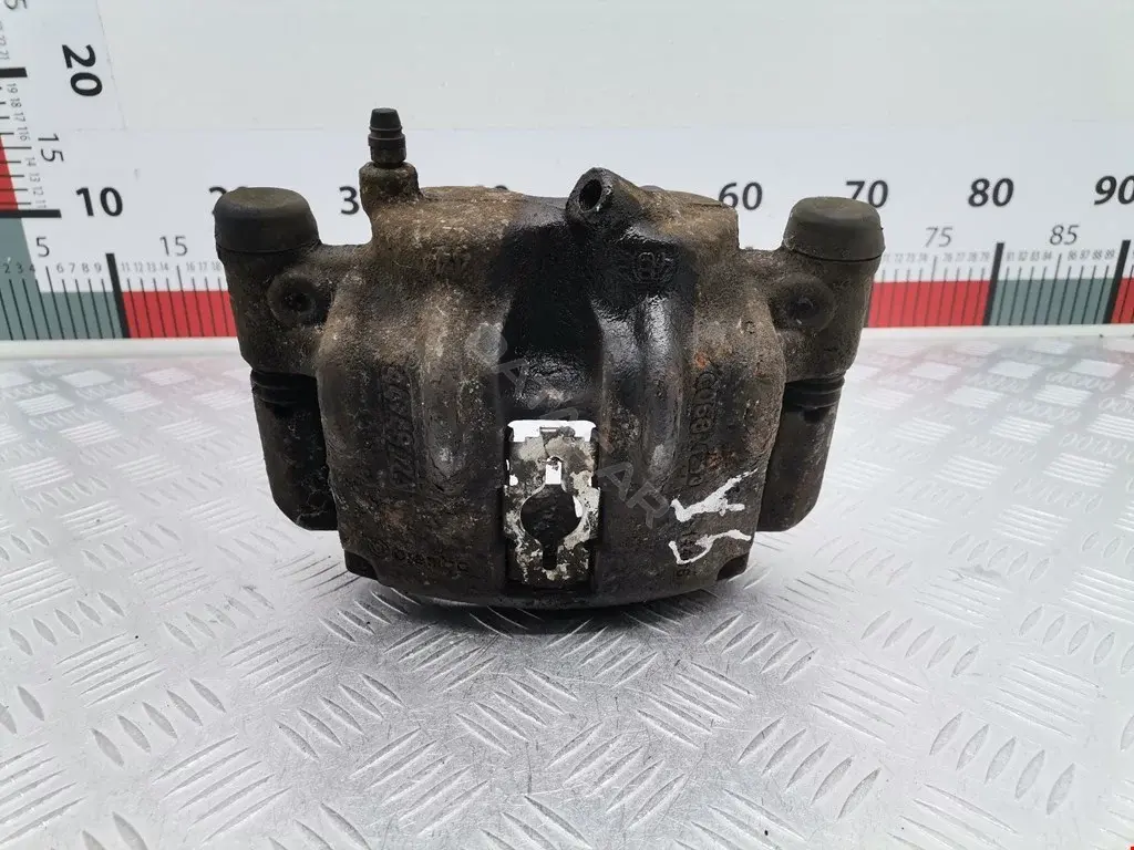 Суппорт тормозной 4401L9