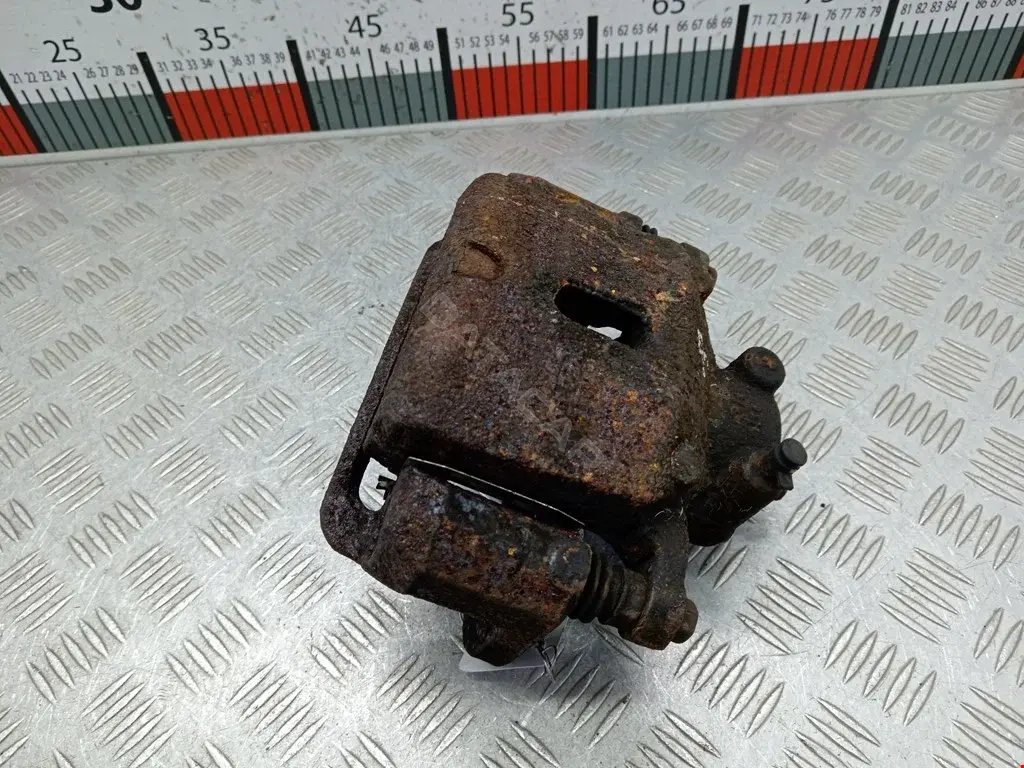 Суппорт тормозной 581303Z100