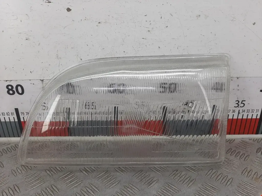 Стекло для фары 9410L