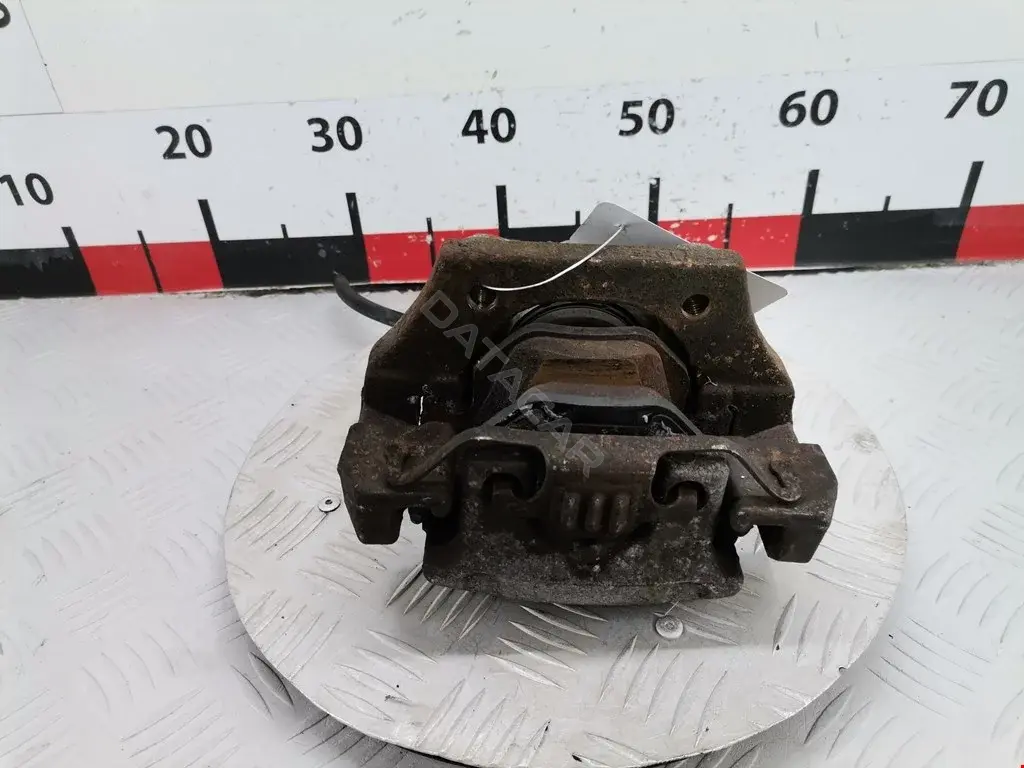 Суппорт тормозной 0986134148, 34216765909, 694665J