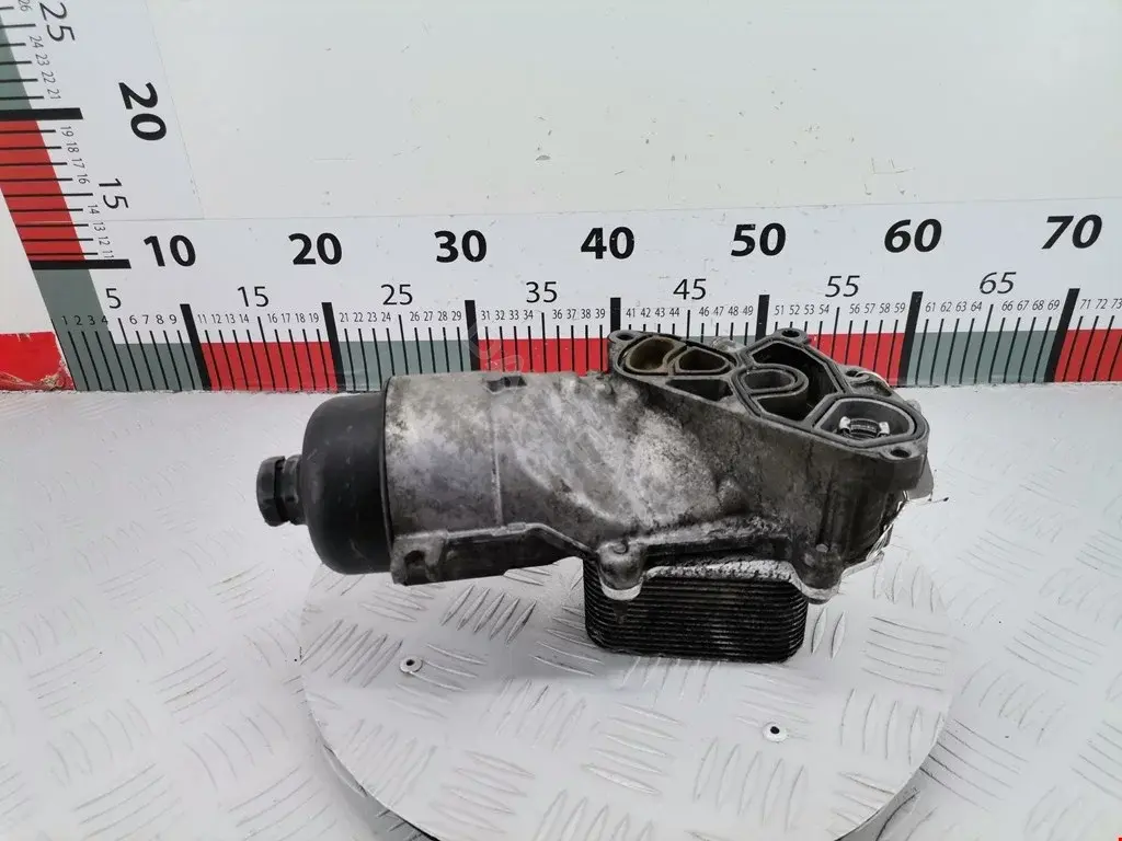 Корпус масляного фильтра 00001103L1, 0011021403, 09013700