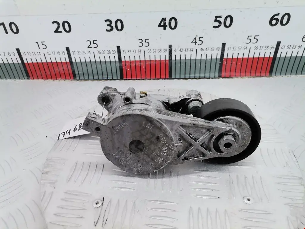Натяжитель ремня генератора 0380715, 03G903315, 03G903315A
