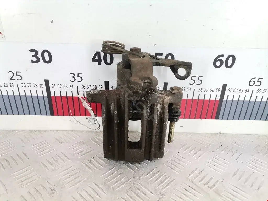 Суппорт тормозной 0590084SX, 0986474831, 100410002