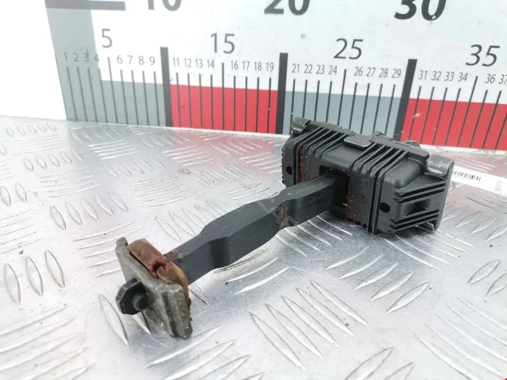 Ограничитель двери 8X23F23552AB
