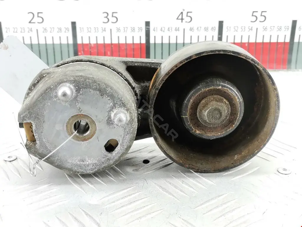 Натяжитель ремня генератора 4R8Q6A228BB, 4R8Q-BB