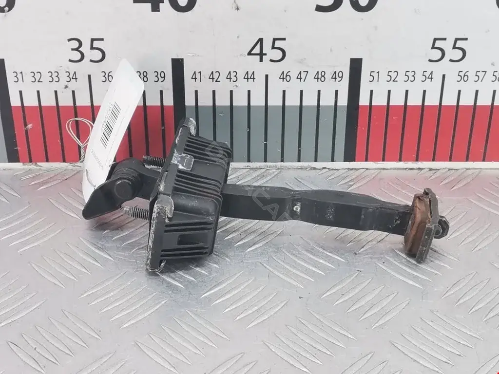 Ограничитель двери 8X23F23552AB