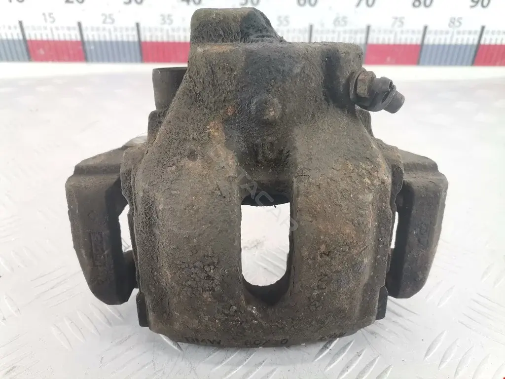 Суппорт тормозной 0590357SX, 0986474262, 34111163304