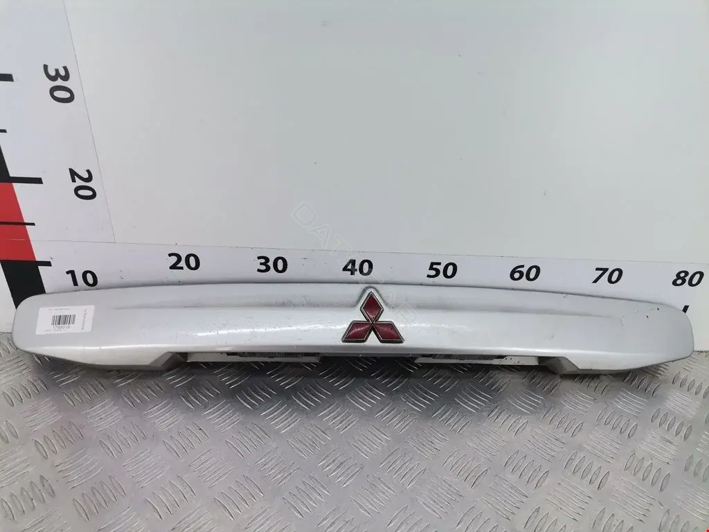 Фонарь подсветки номерного знака MR245531