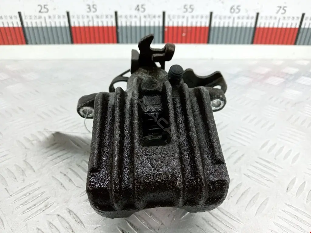 Суппорт тормозной 0590084SX, 0986474831, 100410002