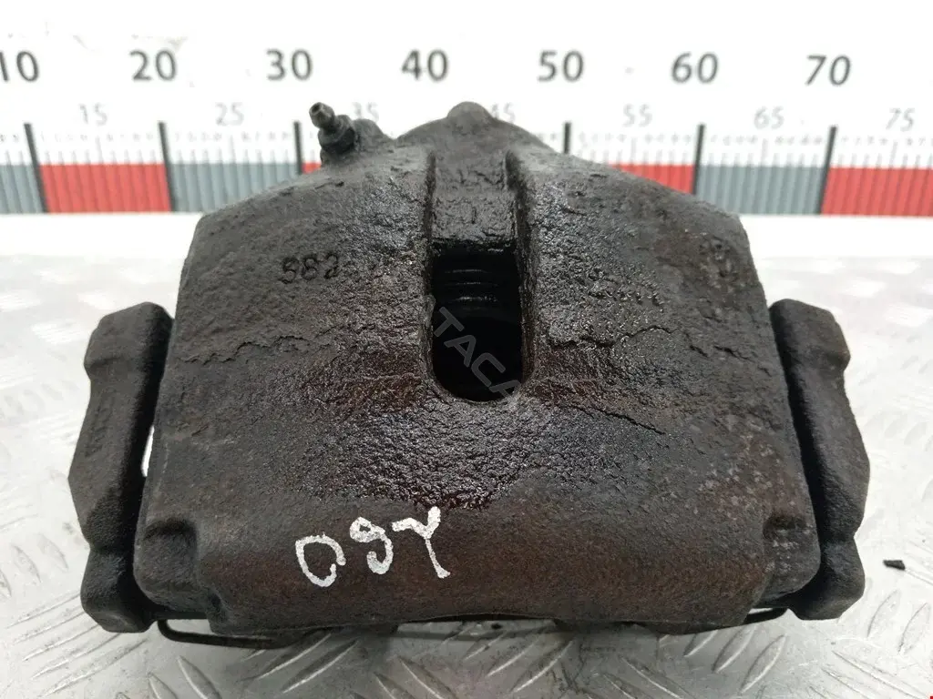 Суппорт тормозной 0590323SX, 09455, 0986474384