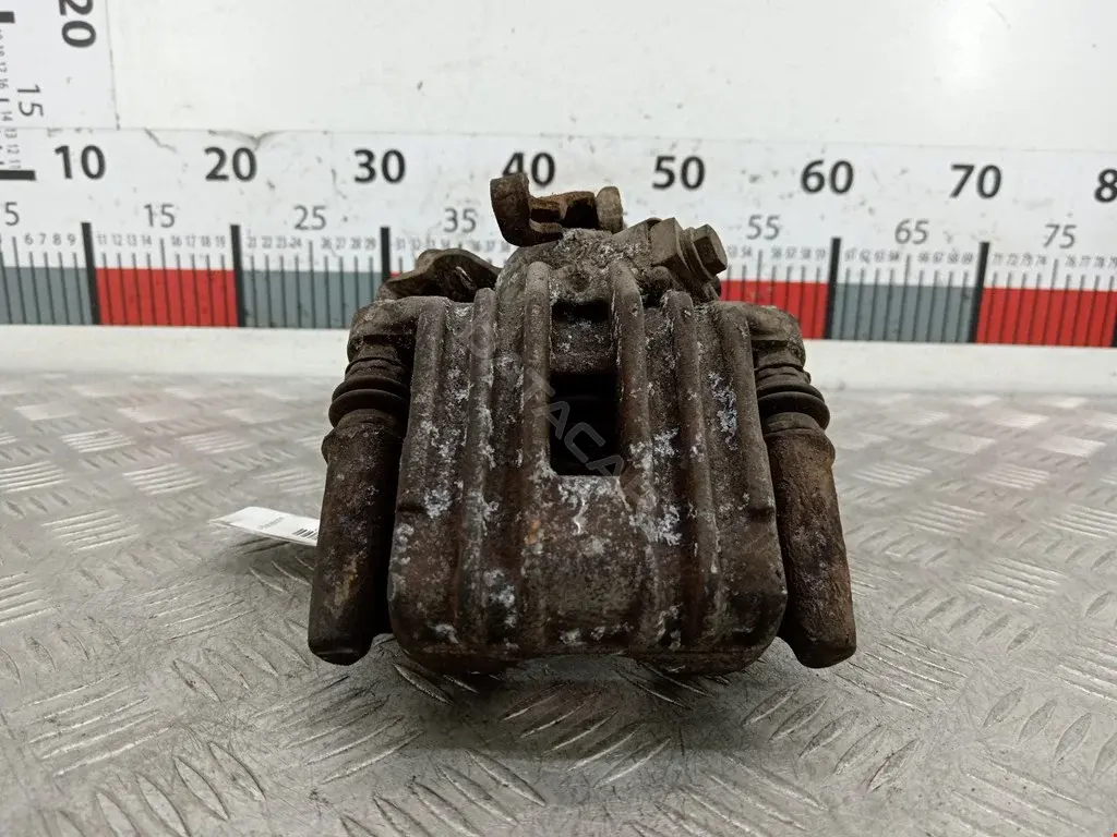 Суппорт тормозной 0590329SX, 0986474099, 1162004880