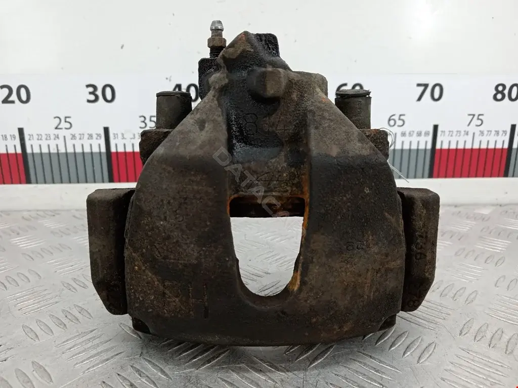 Суппорт тормозной 0590468SX, 0986474385, 11957197862