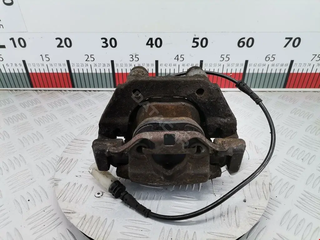 Суппорт тормозной 0986135141, 34210153506, 34212283164