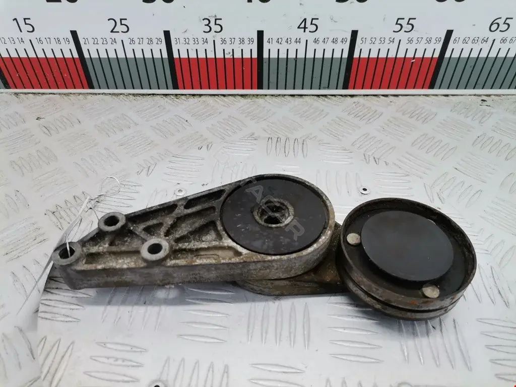 Натяжитель ремня генератора 058903133, 058903133B, 058903133D