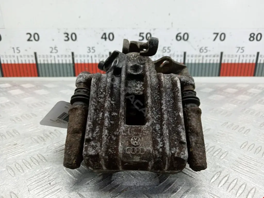 Суппорт тормозной 0590328SX, 0986473099, 100310005