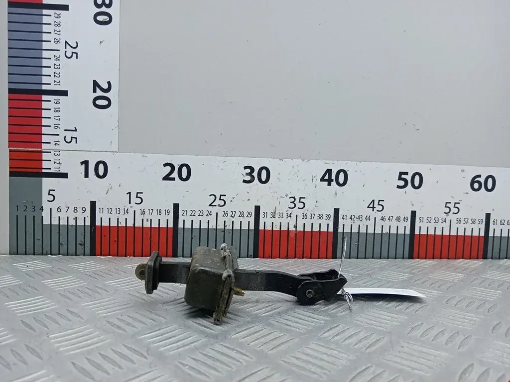 Ограничитель двери A1637300116