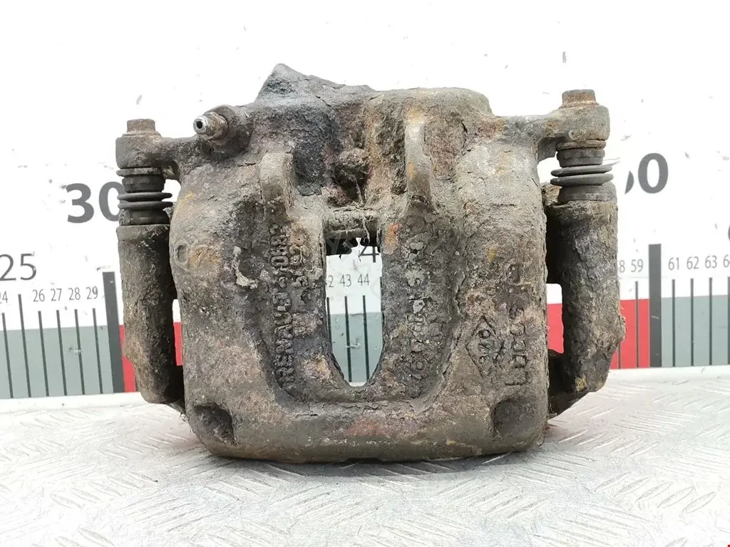 Суппорт тормозной 9199254