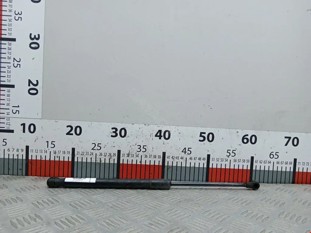 Амортизатор крышки багажника, капота, заднего стекла 1T0823359C