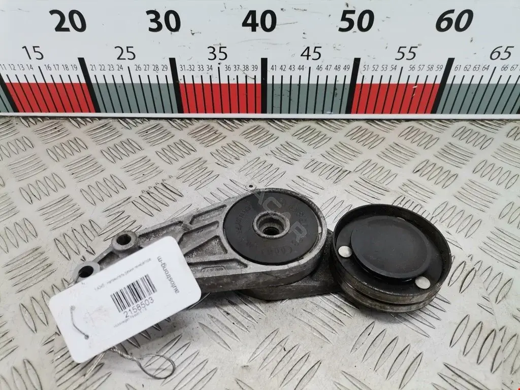 Натяжитель ремня генератора 058903133, 058903133B, 058903133D
