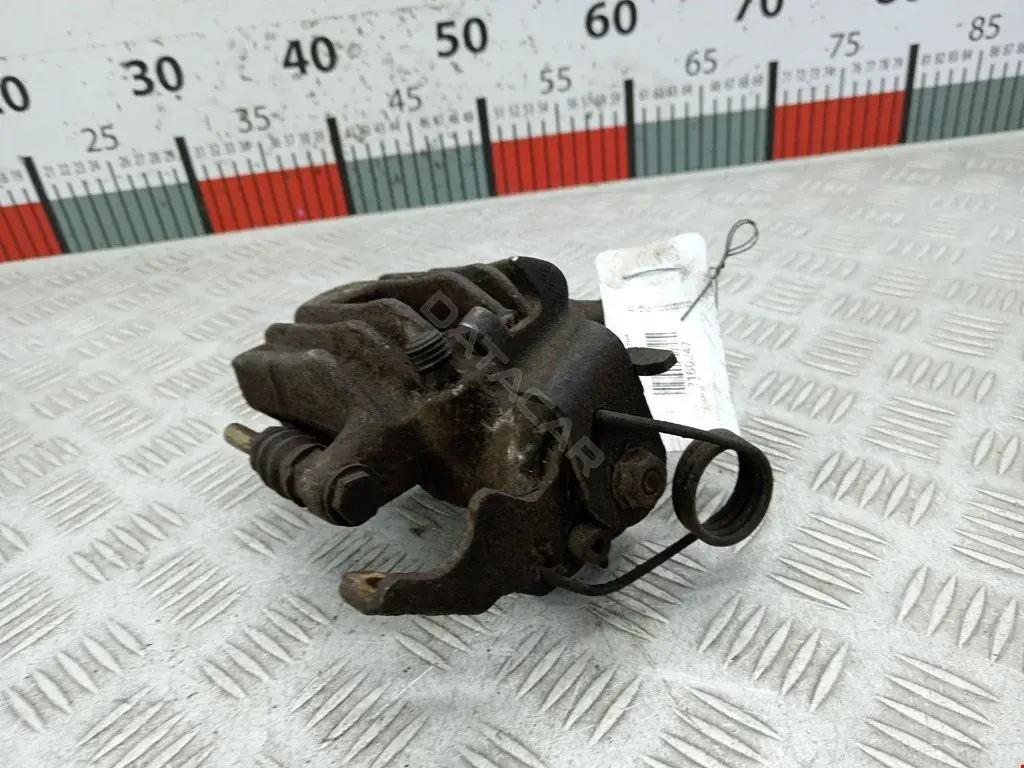 Суппорт тормозной 0590084SX, 0986474831, 100410002
