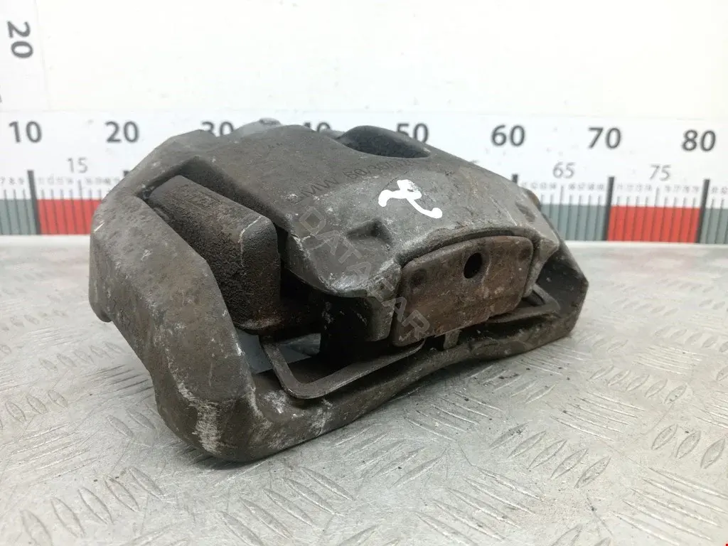 Суппорт тормозной 0986474374, 27414302, 34116753660