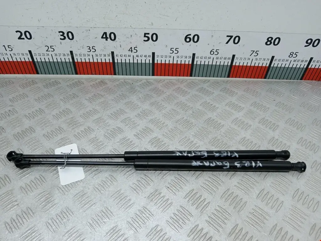 Амортизатор крышки багажника, капота, заднего стекла 8731G9