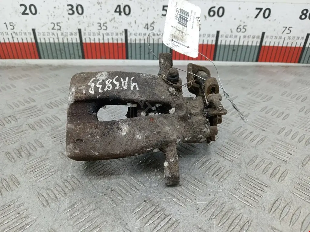 Суппорт тормозной 2209309