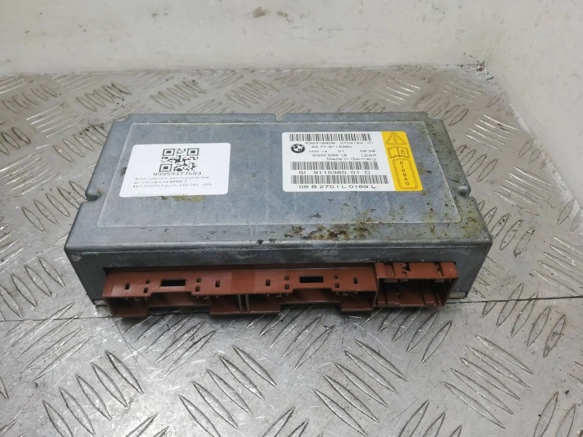 Блок управления подушками безопасности 65779115360, 9115360