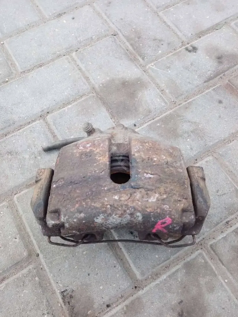Суппорт тормозной 0590323SX, 09455, 0986474384