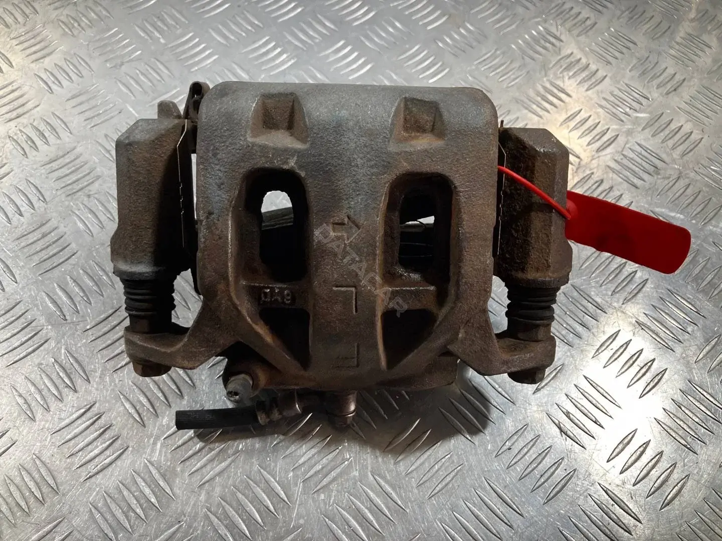 Суппорт тормозной 41011EJ20A