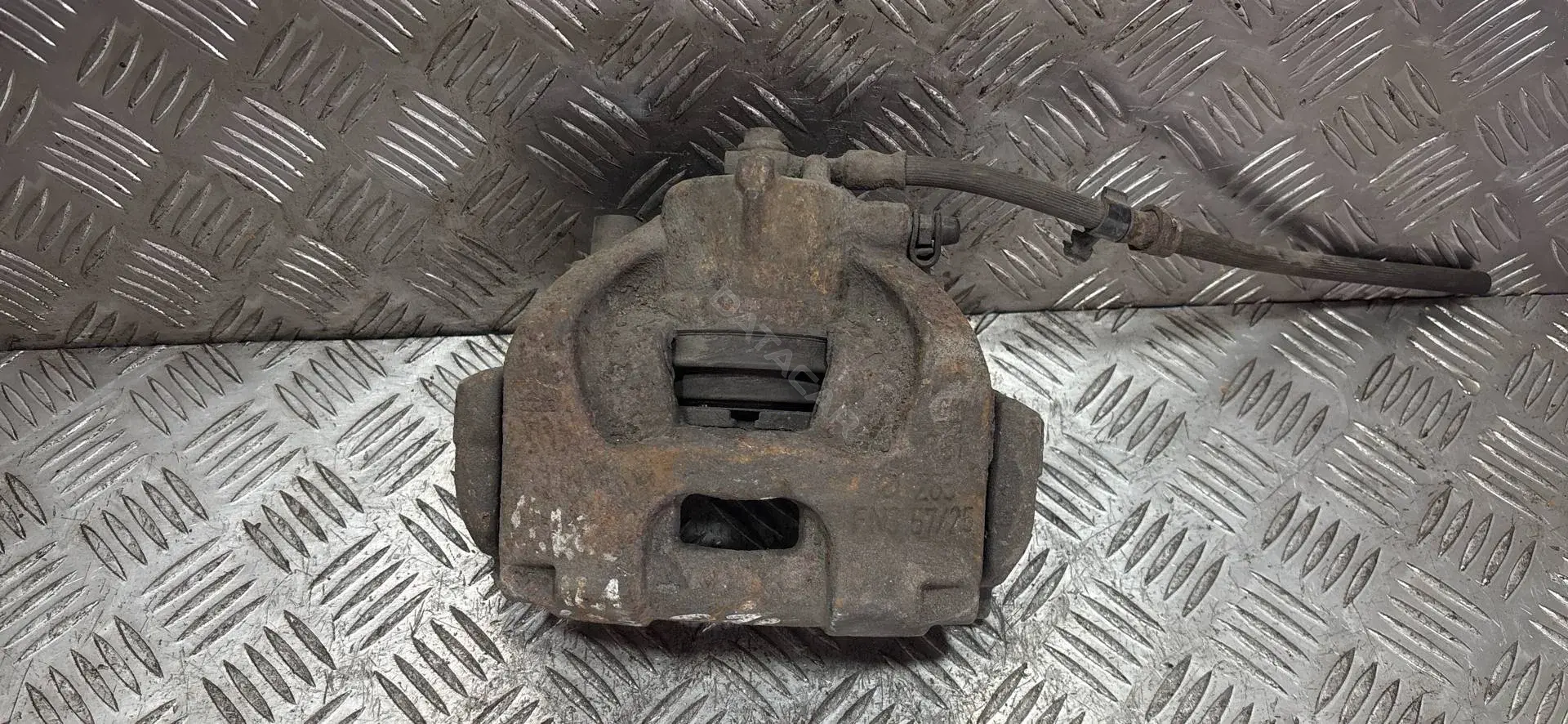 Суппорт тормозной FN35725