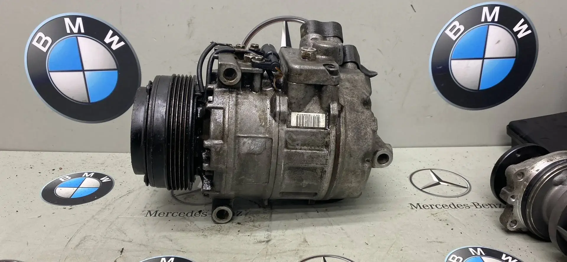 Компрессор кондиционера 6910458