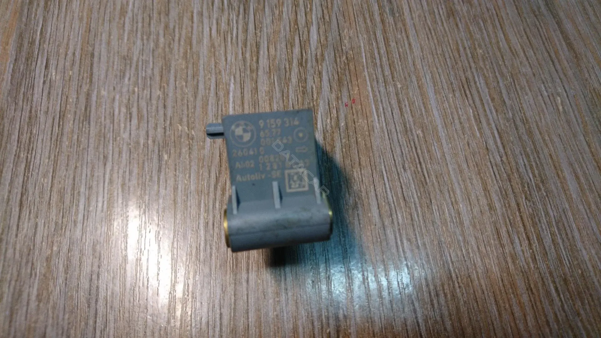 Датчик удара 65779159314