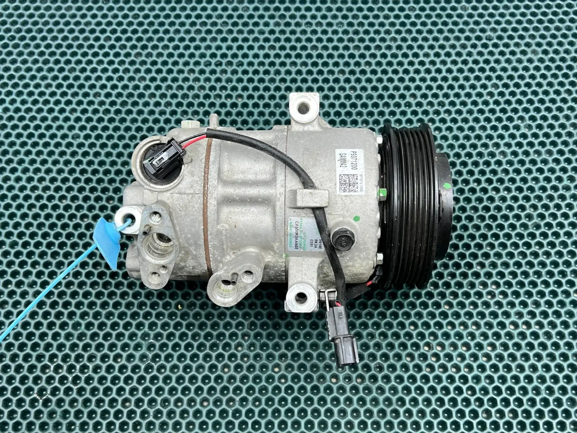 Компрессор кондиционера 97701L1200