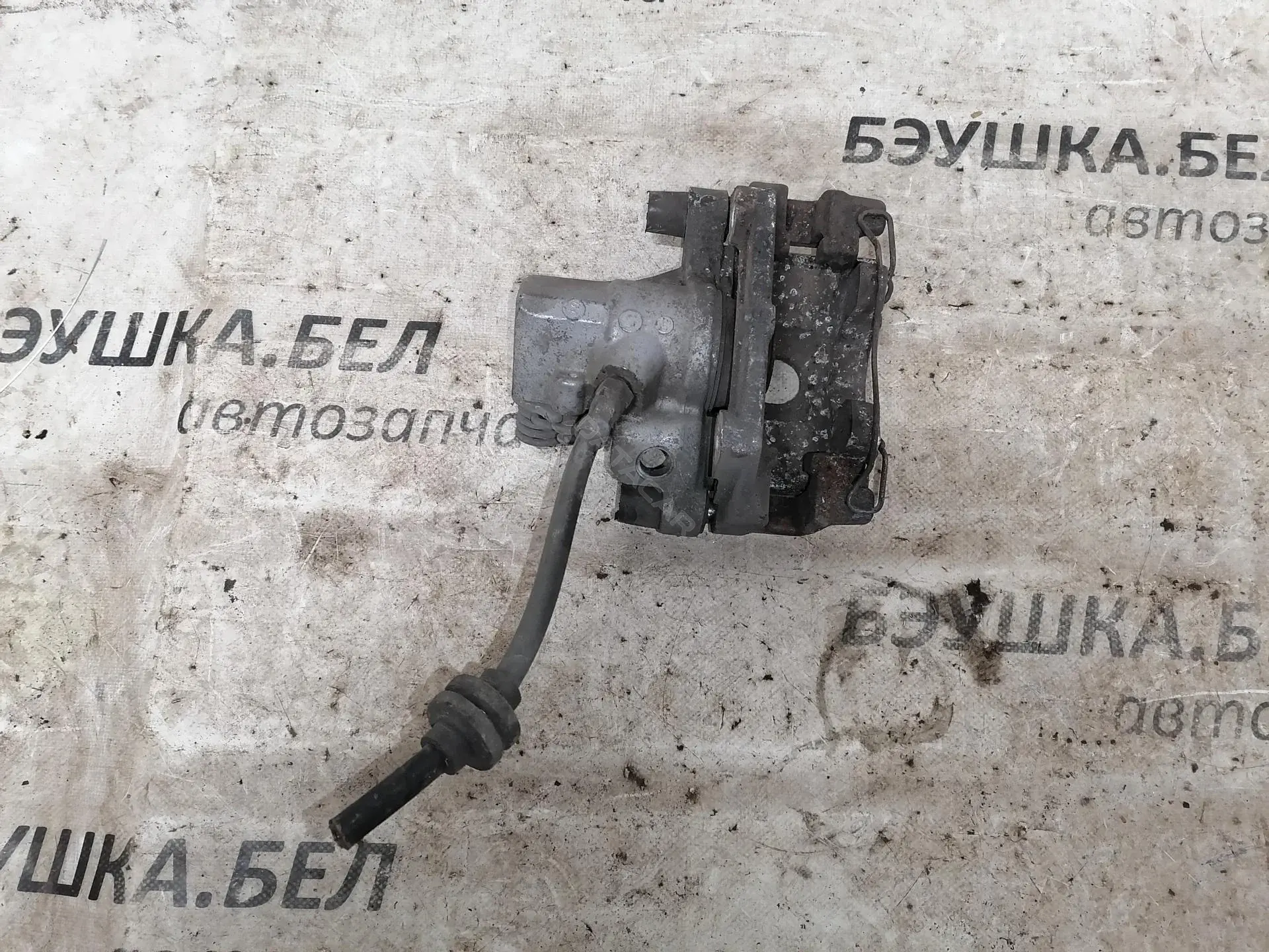 Суппорт тормозной 11938770162