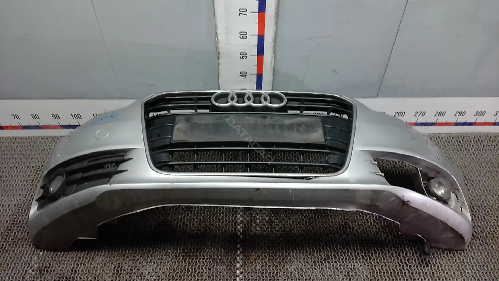 Передний бампер UOK56G501